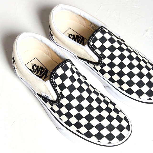 Vans checkered 2025 slip on price