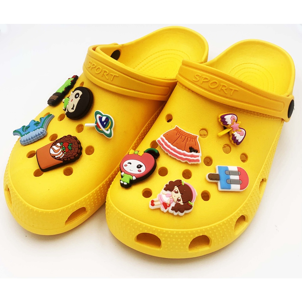 Yellow crocs with discount pins