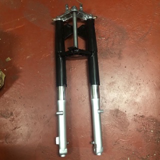 tmx 155 front shock