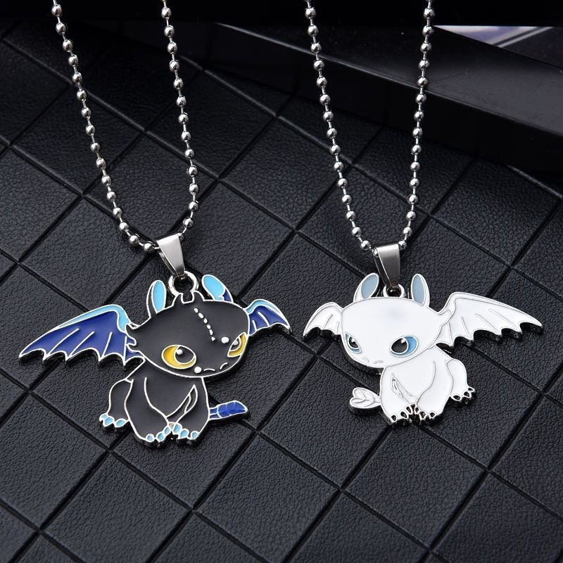 Nightfury lightfury necklace- How to train your dragon - Geek and Artsy