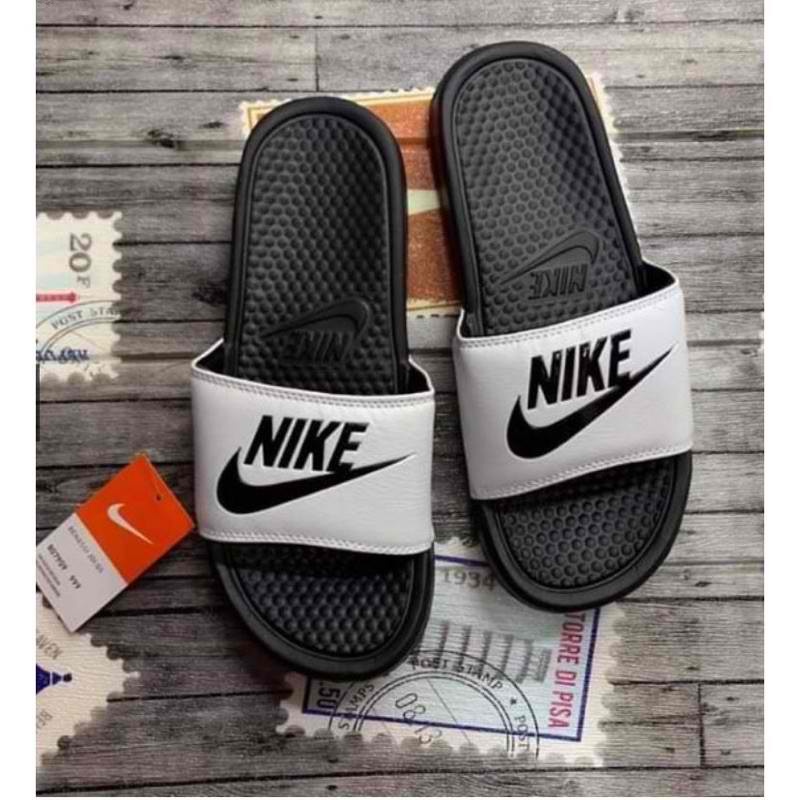 Nike slippers white and black online