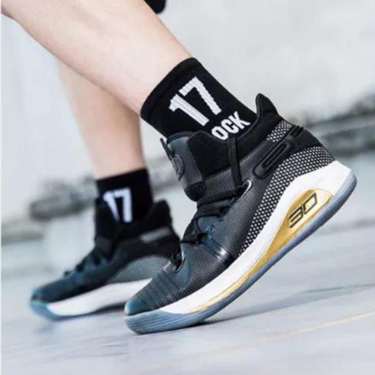 Curry 6 black and store gold