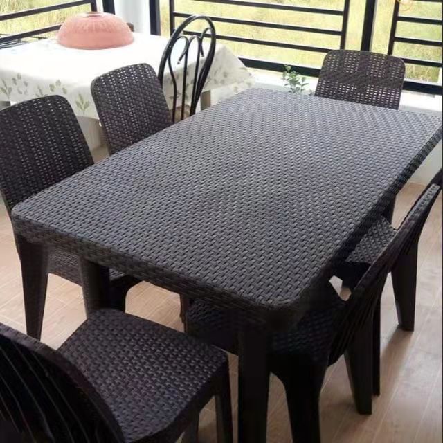 Plastic rattan deals table and chairs