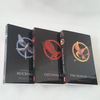 The hunger games trilogy by Suzzane Collins the hunger games book ...