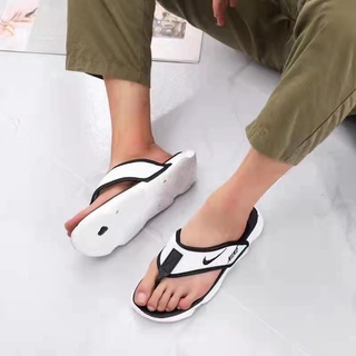 Nike slippers hot sale under 4