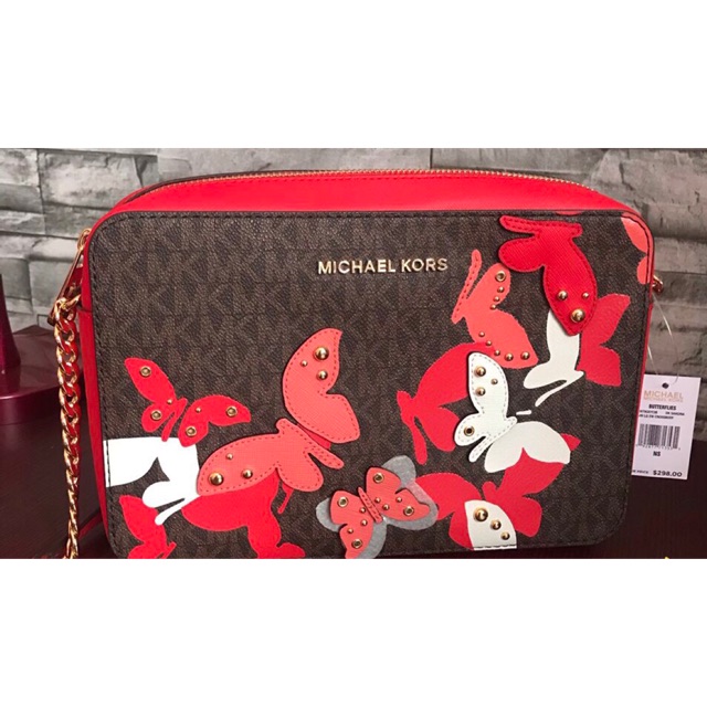 Michael kors bag with butterfly hot sale