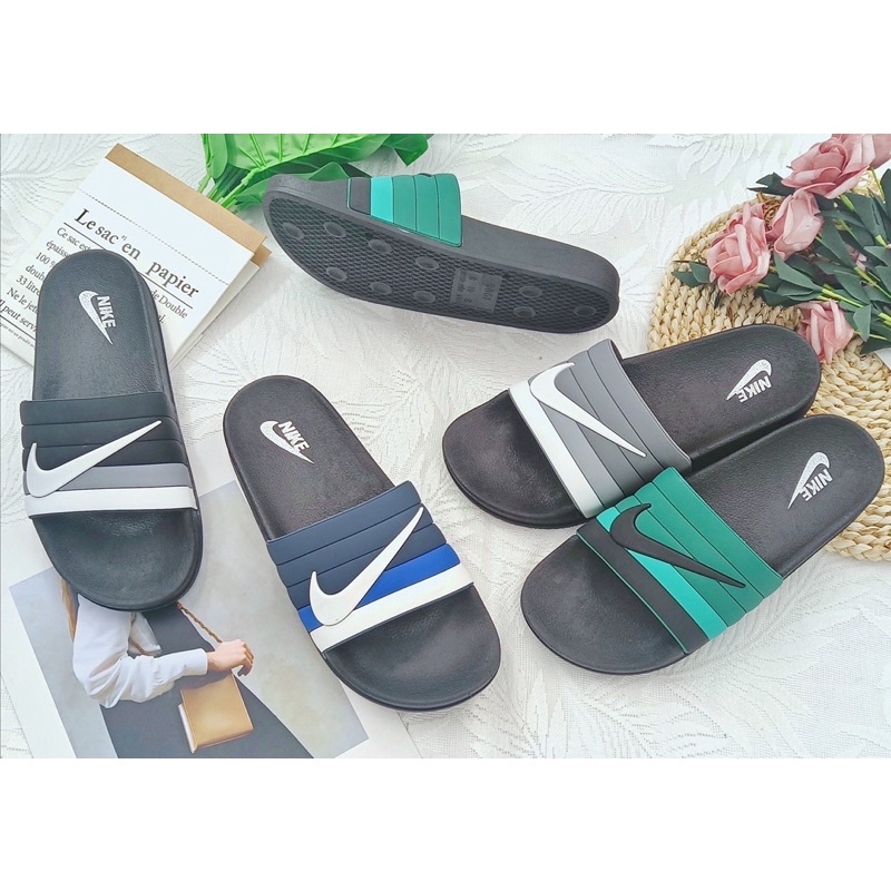 Nike hot sale slippers design