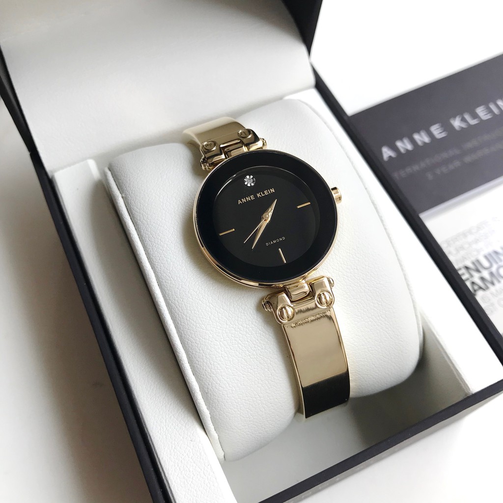 Anne klein black discount and gold watch