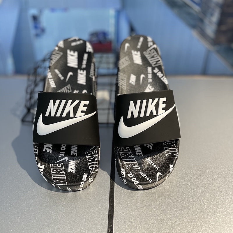 Nike slippers new design best sale