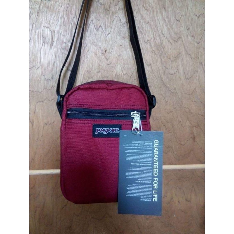 Jansport sling hot sale bag small