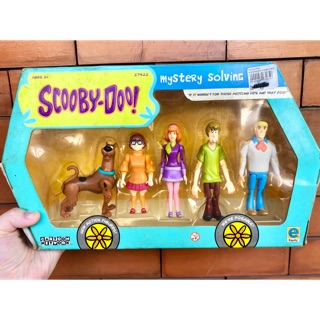 The Mystery Machine and Scooby Doo mystery solving crew toys.