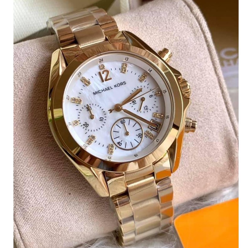 mk mother of pearl watch