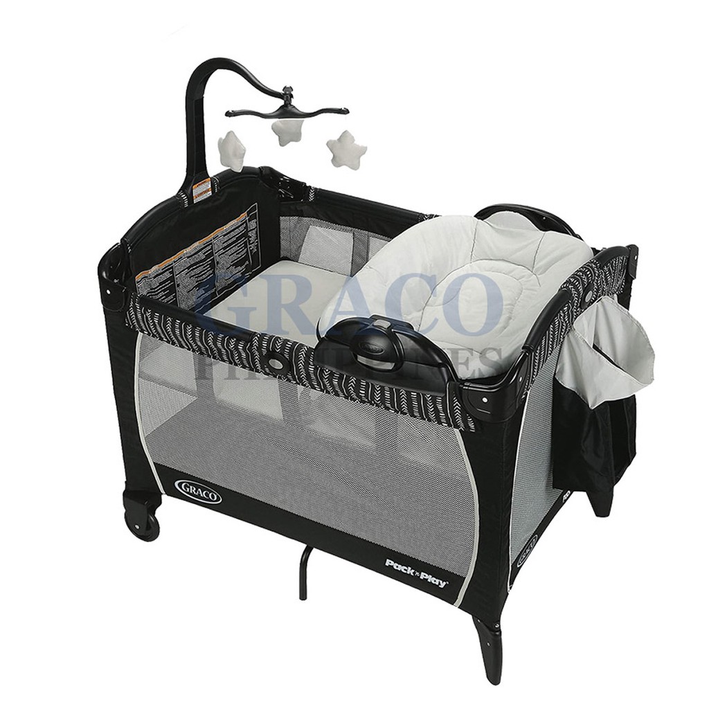 Graco polka dot pack n outlet play