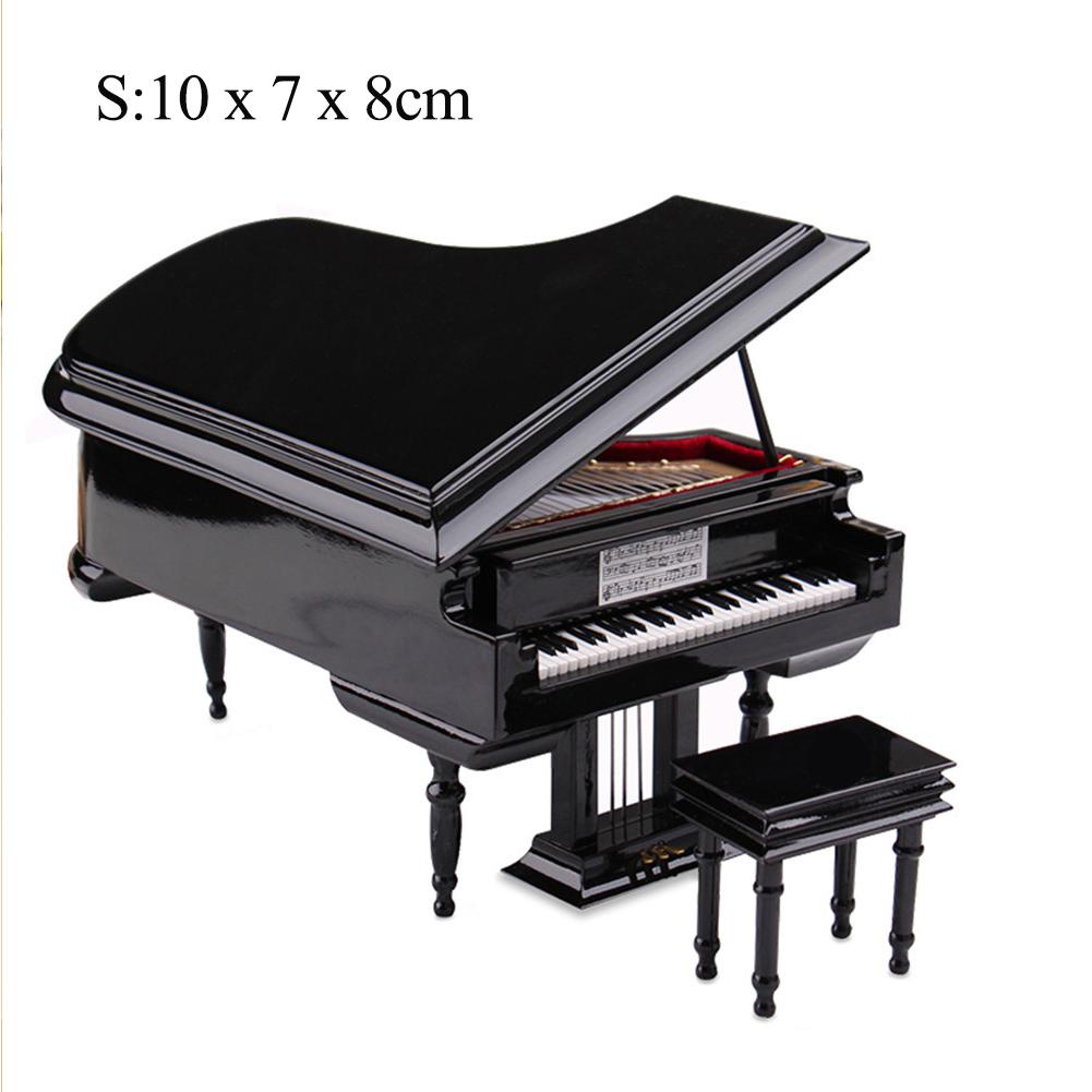 Small piano type deals instrument