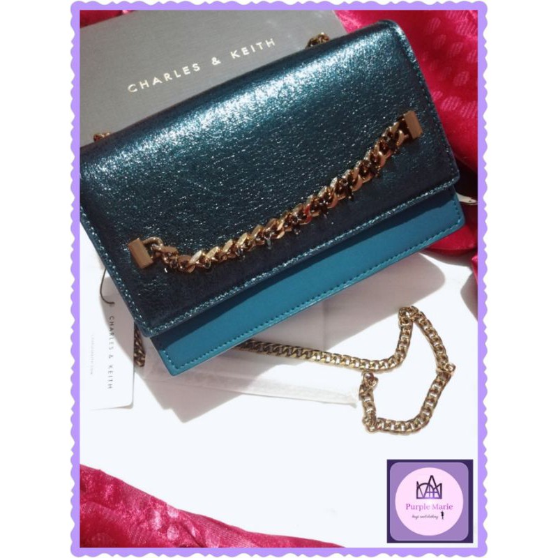 Charles and keith blue sling bag hot sale