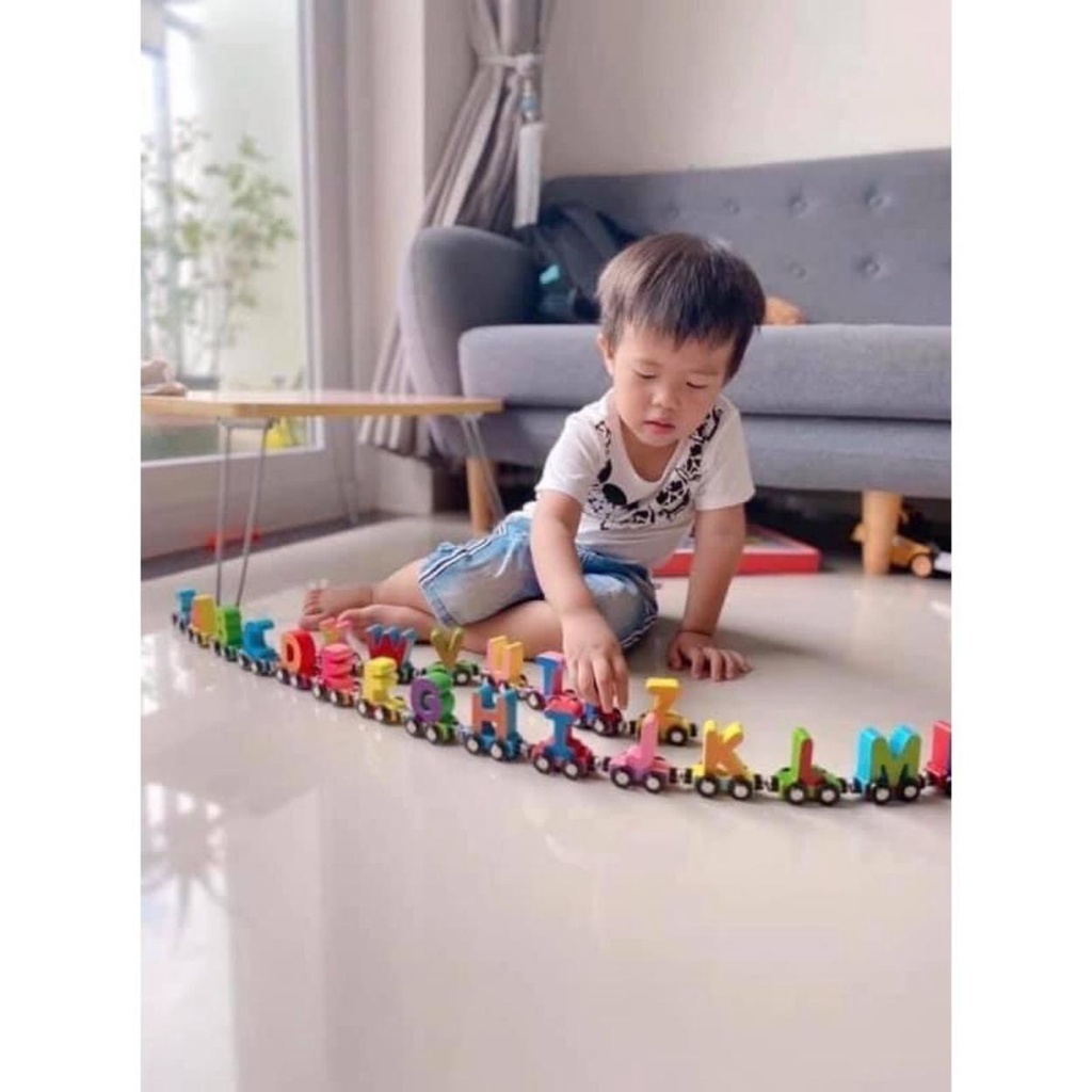 Wooden train toy that pulls numbers and letters helps children