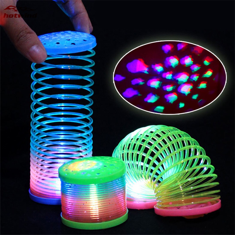 HW 1Pc Glow in Dark Walking Rainbow Spring Toy Kid Magic Luminous ...