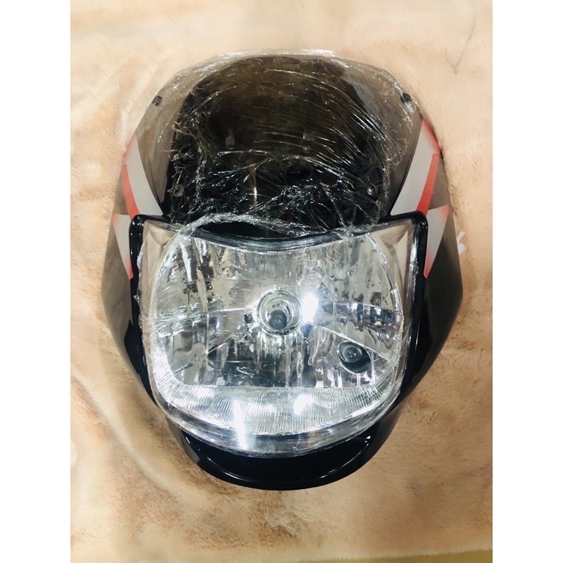 Ct 100 headlight best sale cover