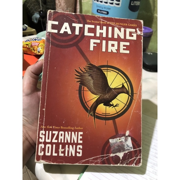 Catching fire by Suzanne Collins | Shopee Philippines