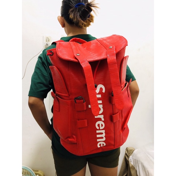 Supreme leather outlet backpack red