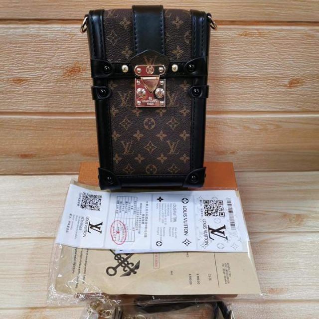 Lv pochette trunk discount verticale