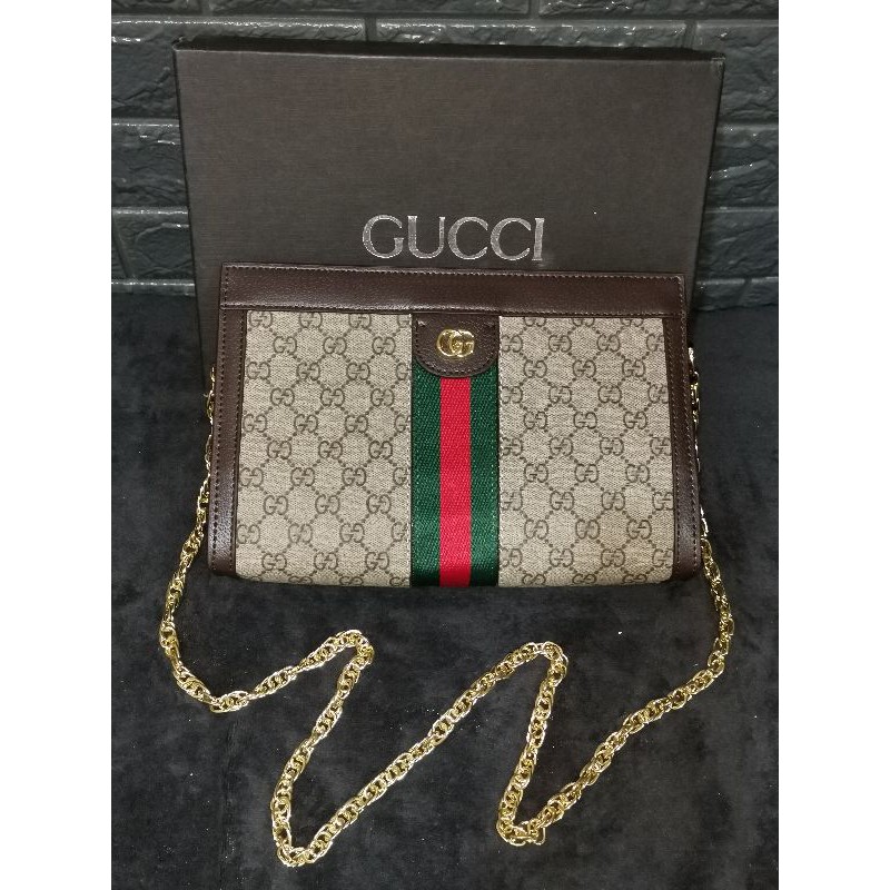 Gucci chain sling discount bag