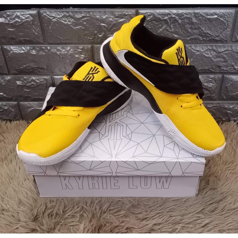 Kyrie 4 low deals yellow and black