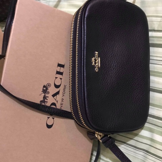 Coach cheap pouch price