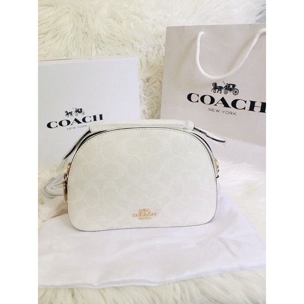 Coach white store sling bag