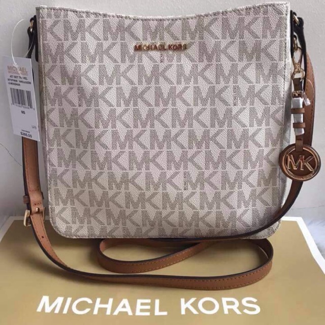 Michael kors sling bags price sale