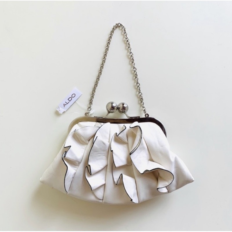 Ruffle clutch online bag