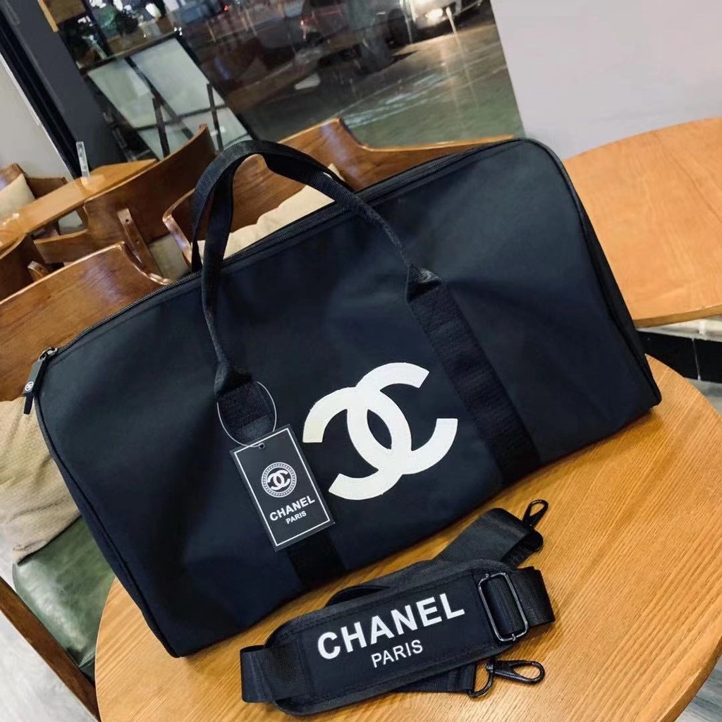 Chanel duffle bag on sale black and white