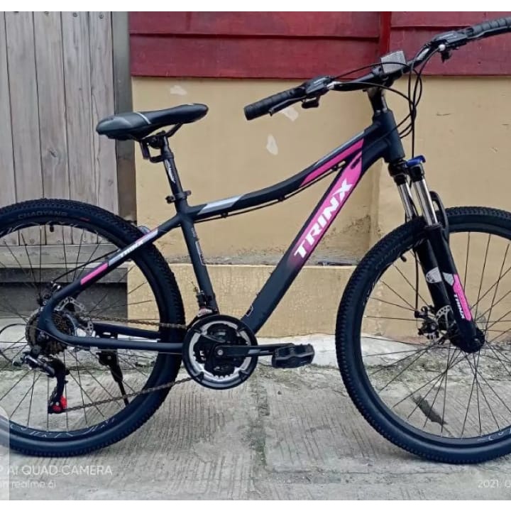 Pink trinx online bike