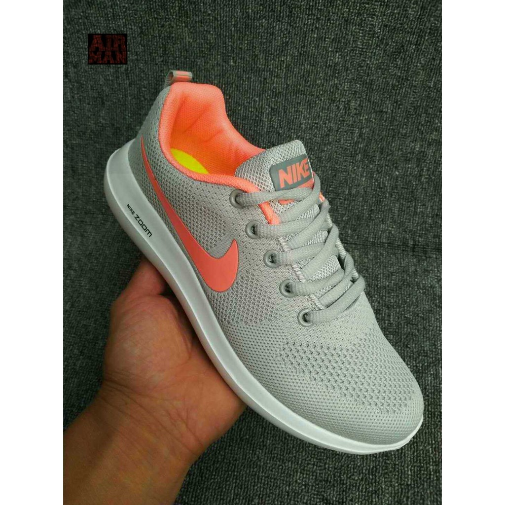 Nike gray shop and orange shoes