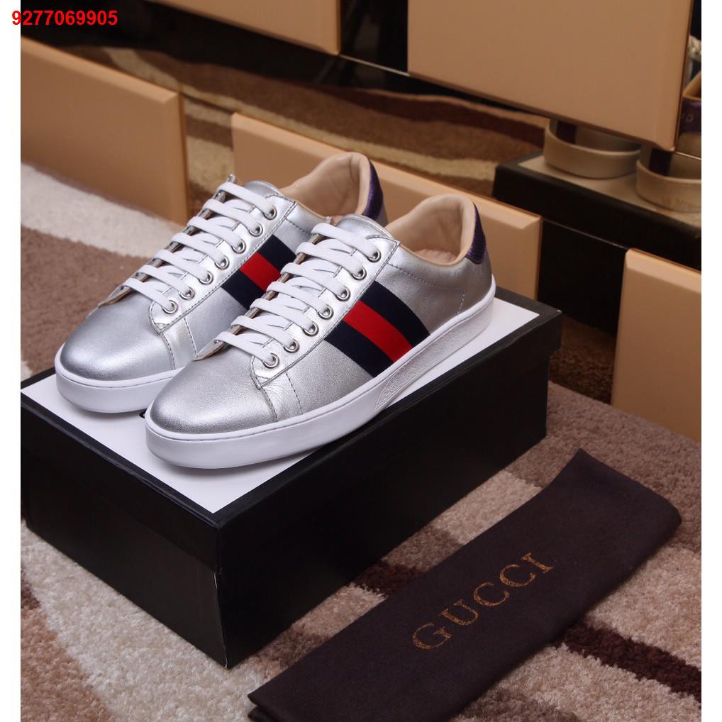 Gucci store silver slippers