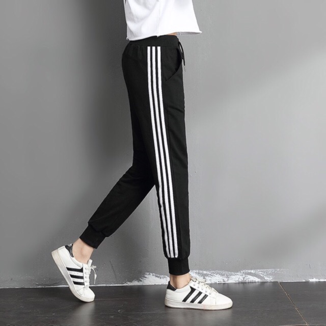 Jogging pants with on sale stripes