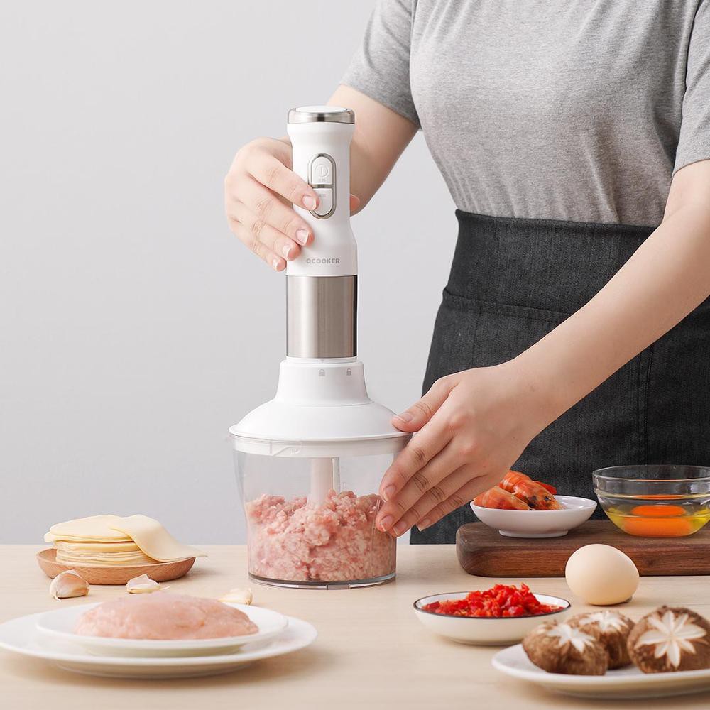 Hand held outlet food processor