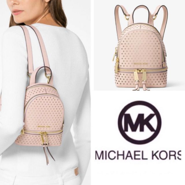 Michael kors perforated discount backpack