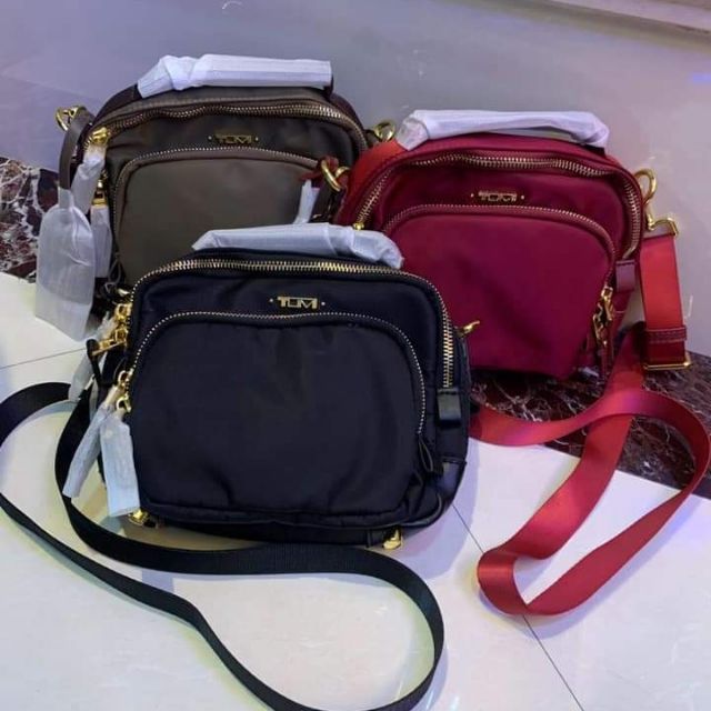 tumi sling bag ladies