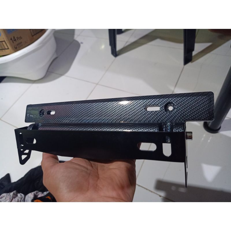 Universal adjustable tilting plate holder with carbon design with TRD