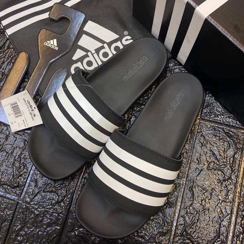 Black and white striped slides hot sale