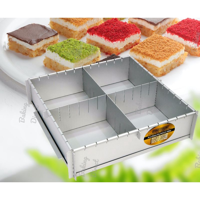 Cake pan outlet divider