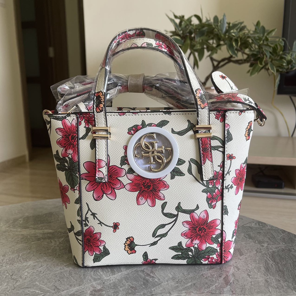 Guess floral sling bag sale