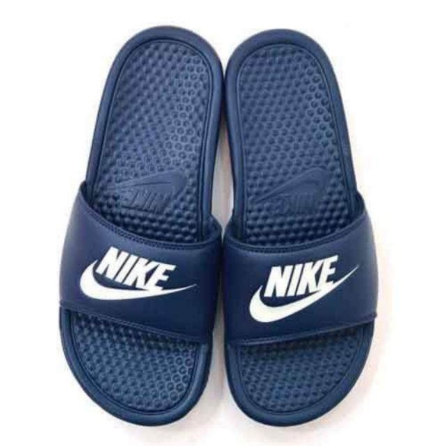 Nike benassi best sale blue slides