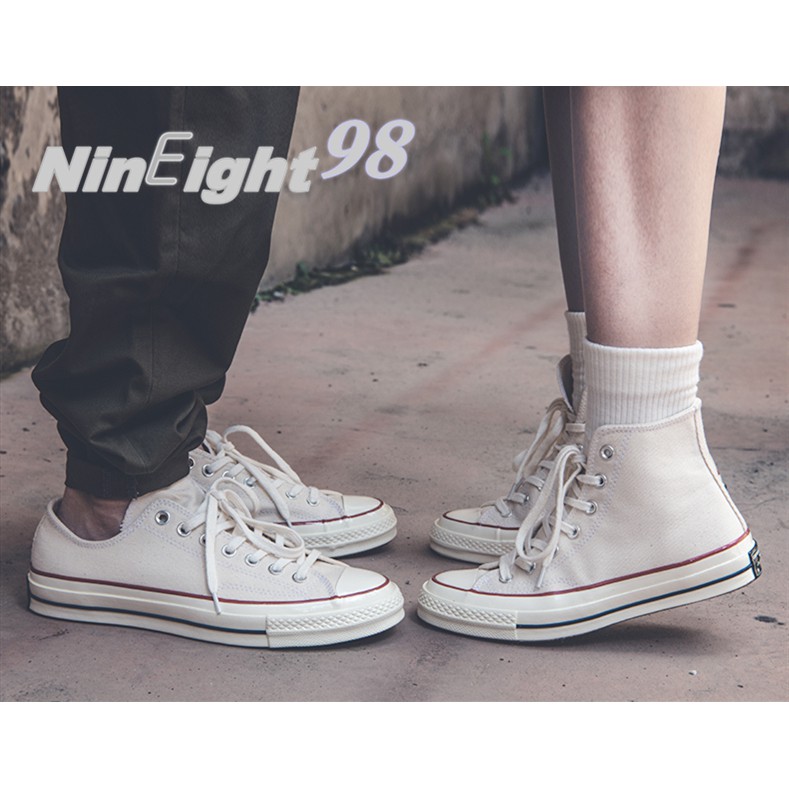 White high top converse vs low sales
