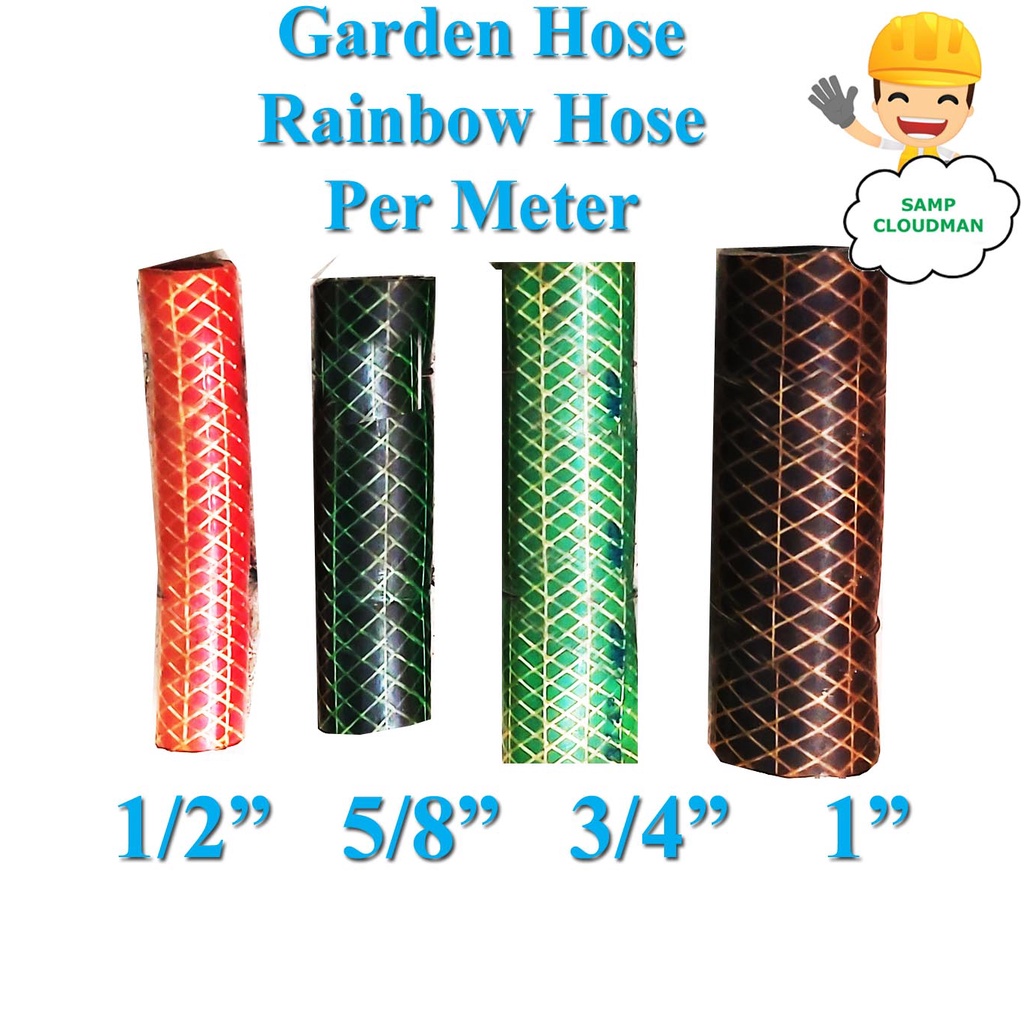 Water Faucet With Rubber Tube Roll In Garden Stock Photo