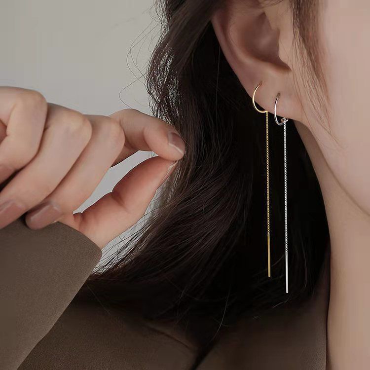 Long chain tassel earrings hotsell