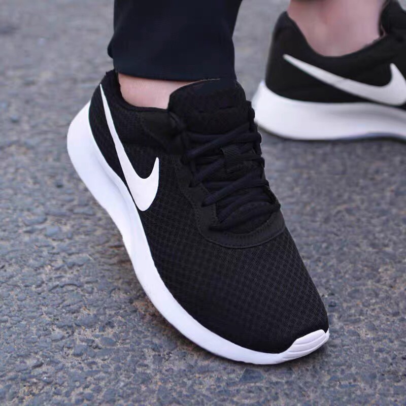 Nike rubber shoes on sale black and white