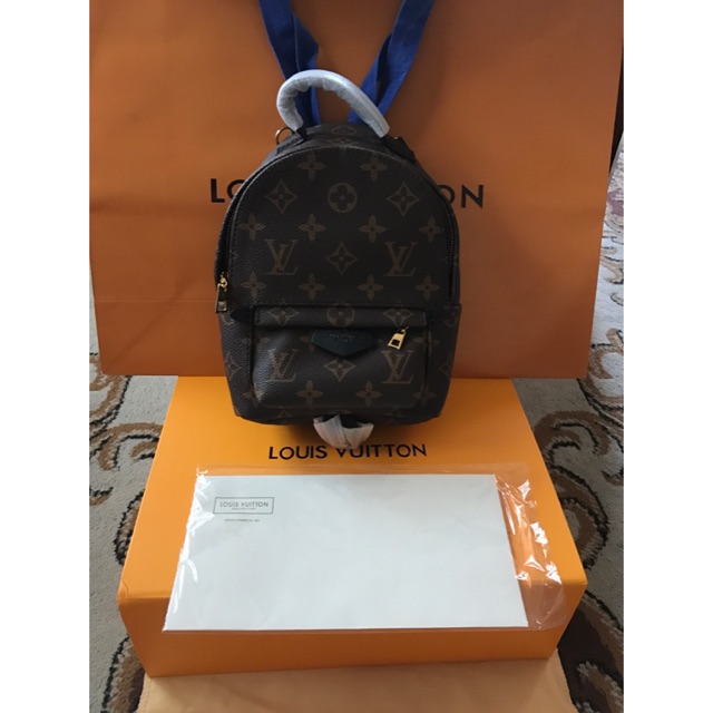 Which Lv palm spring backpack is real? #LOUISVUITTON