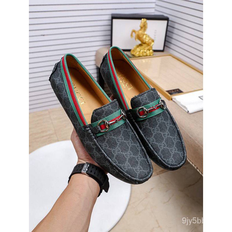 Gucci store men's flats